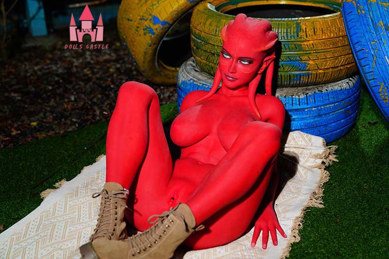 a red-skinned alien sex doll